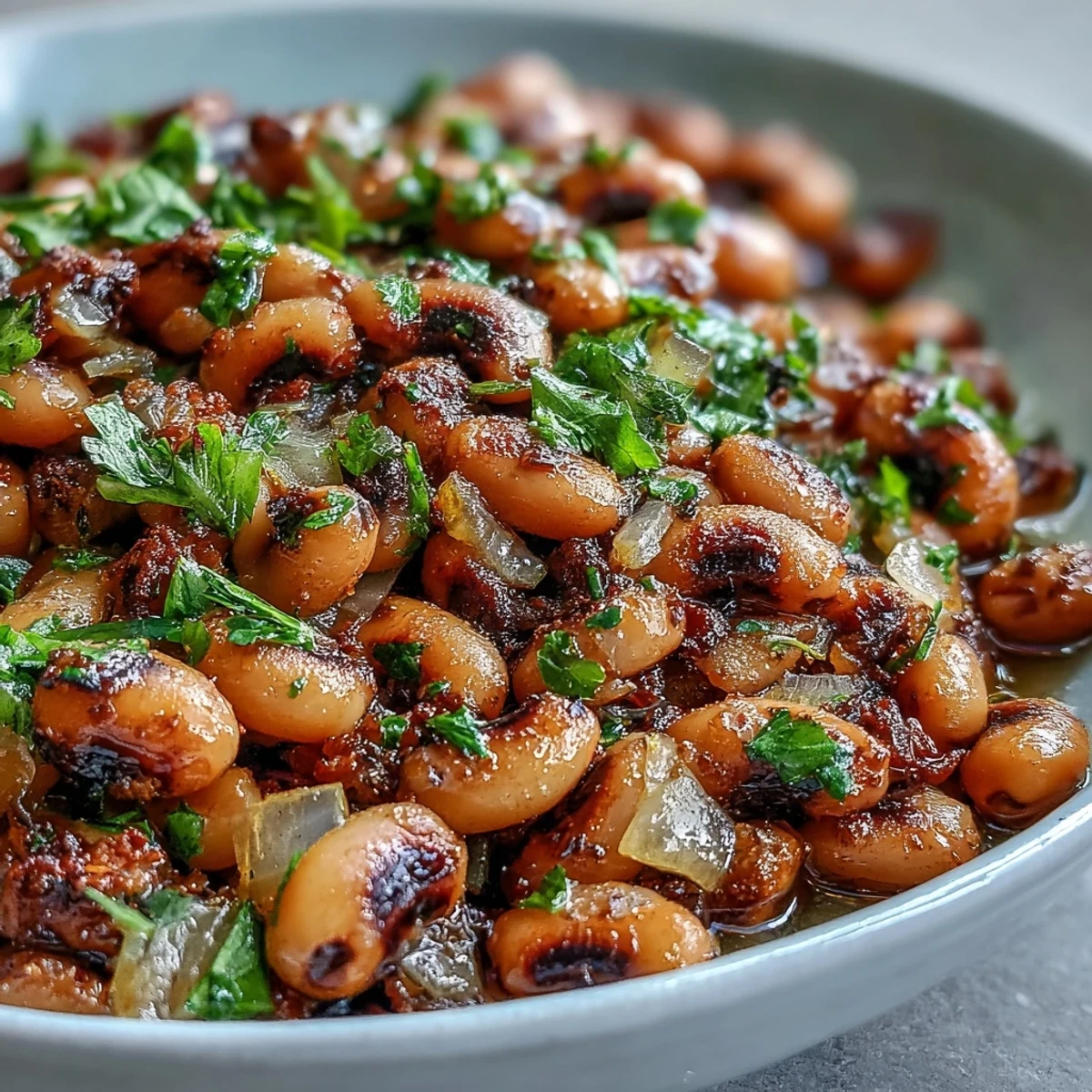 Fork-tender Frozen Black-Eyed Peas Quick Version simmered in a savory broth with onions, garlic, and a pinch of smoked paprika.