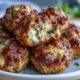Freshly baked Rotel Sausage Balls served warm on a rustic platter, perfect for a savory game-day appetizer or brunch spread.