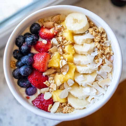 Breakfast Smoothie Packs, thick and creamy, ready for toppings of granola and fresh fruit.