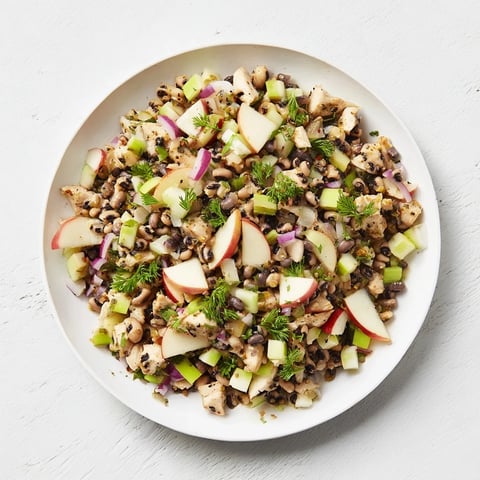 Golden, glistening Chicken and Apple Luck Salad with crisp apples and a creamy dressing ready to enjoy.