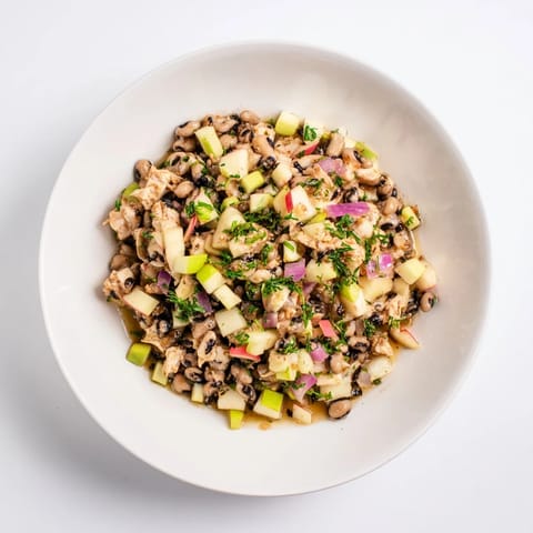 Fresh, colorful Chicken and Apple New Years Luck Salad, bursting with flavors and textures for good fortune.