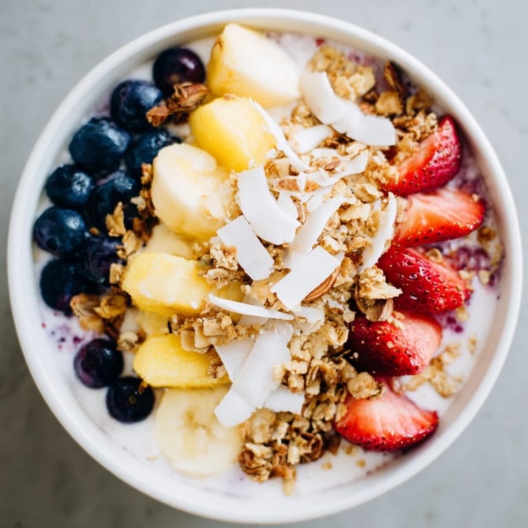 Vibrant Breakfast Smoothie Packs blending frozen fruit with yogurt, creating a fast and healthy morning meal.