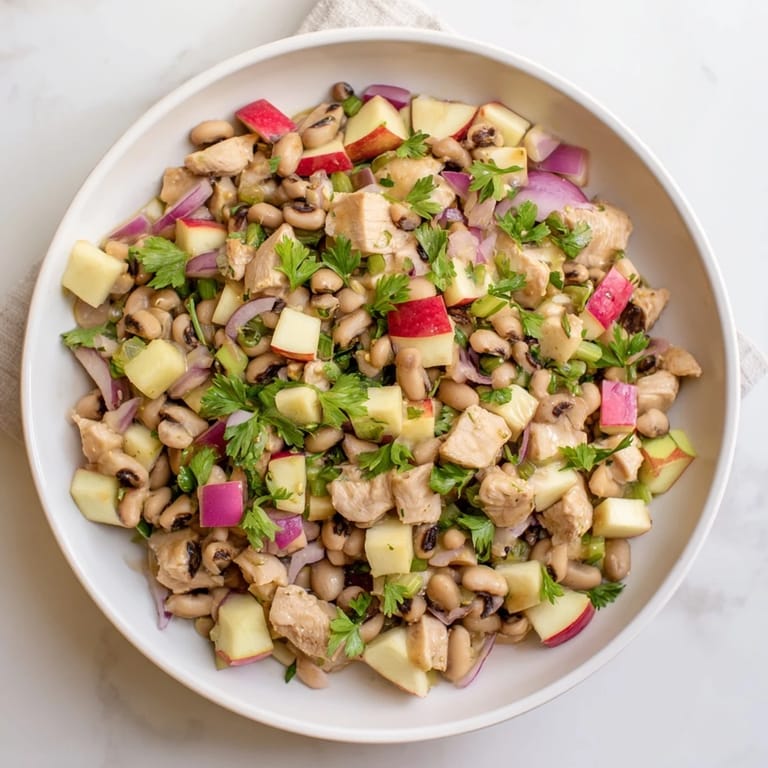 Tender chicken and sweet apples are tossed in a tangy dressing within this lucky Chicken and Apple Salad.