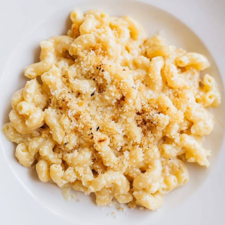 Homemade mac and cheese, the ultimate comfort food, with a silky smooth cheese sauce.