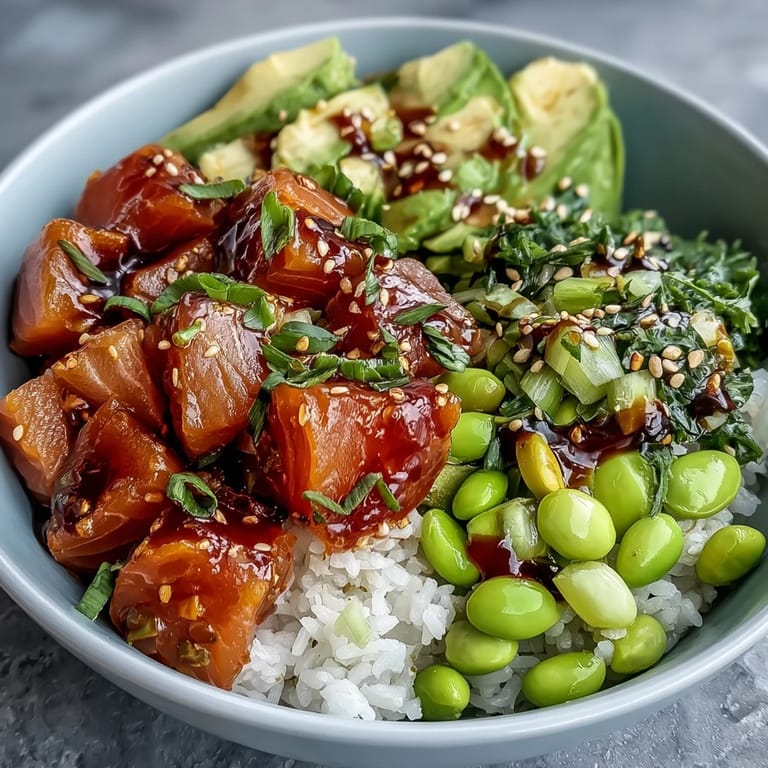 Fresh Hawaiian Salmon Poke Bowl, perfectly plated with colorful vegetables and rice.